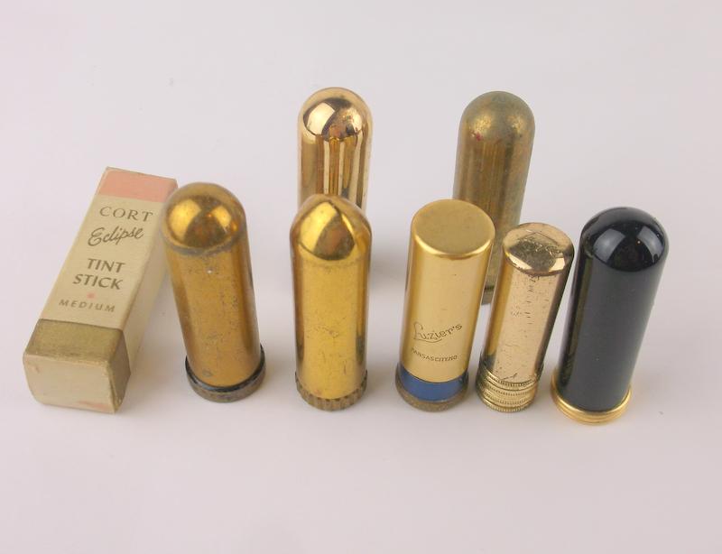 Antique 1950s Original Lipstick Lot Pin Up Style: A Lot of original antique 1950s lipsticks. They have been used, most look like they are still very usable. Many of these colors were very difficult to reproduce and very scarce.