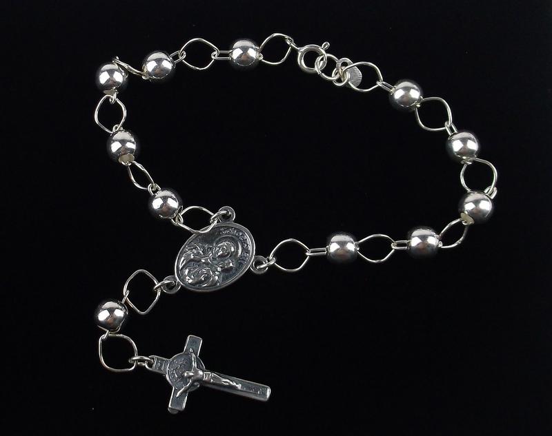 New Sterling Silver Catholic Rosary Bracelet 7.5": Solid Sterling Silver Guaranteed, in Brand New Never Worn Condition.