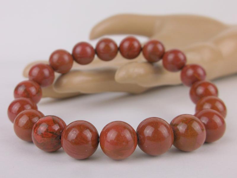 New Healing Genuine Carnelian Bracelet 10mm: Healing Genuine Gemstone Bracelet, Stretches to fit, in Brand New Condition.