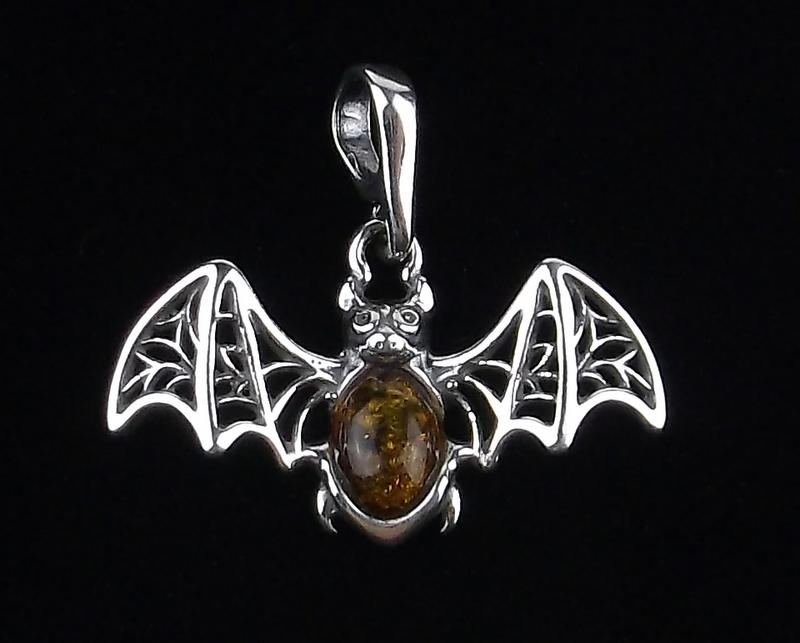 New Sterling Silver Genuine Amber Bat Pendant: Solid Sterling Silver Guaranteed, in Brand New Never Worn Condition.