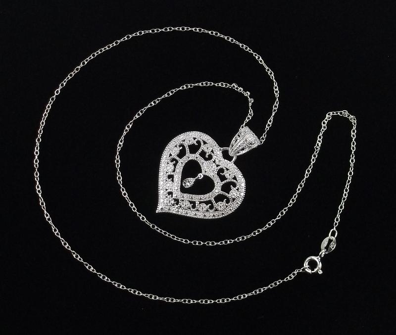 New Sterling Silver Heart Chain Necklace 18": Solid Sterling Silver Guaranteed, in Brand New Never Worn Condition.