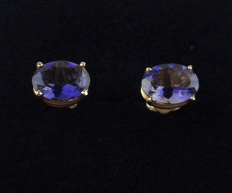 New Boxed 10kt Gold 1.75cttw Tanzanite Earrings: 10kt gold in excellent condition.