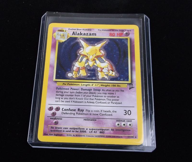 Vintage 2000 Pokemon Alakazam Rare Holo Card: A Vintage Pokemon Original Card in Top Loader and penny sleeve
