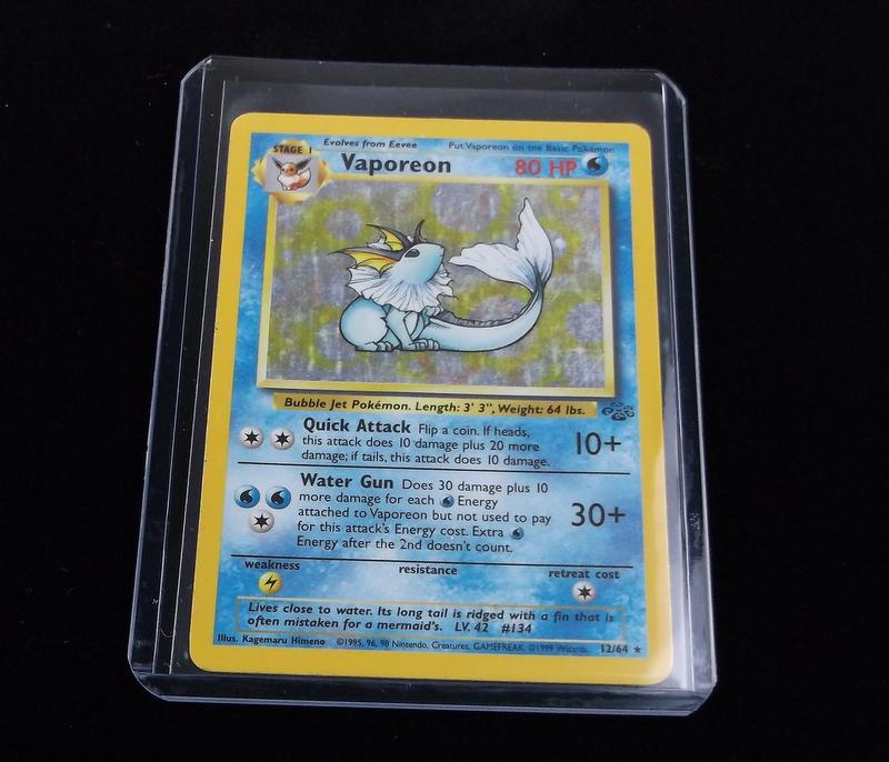 Vintage 1999 Pokemon Vaporeon Rare Holo Card: A Vintage Pokemon Original Card in Top Loader and penny sleeve