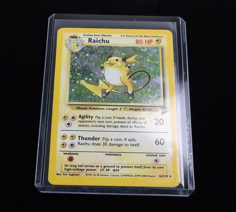 Vintage 2000 Pokemon Raichu Rare Holo 2nd Ed Card: A Vintage Pokemon Original Card in Top Loader and penny sleeve