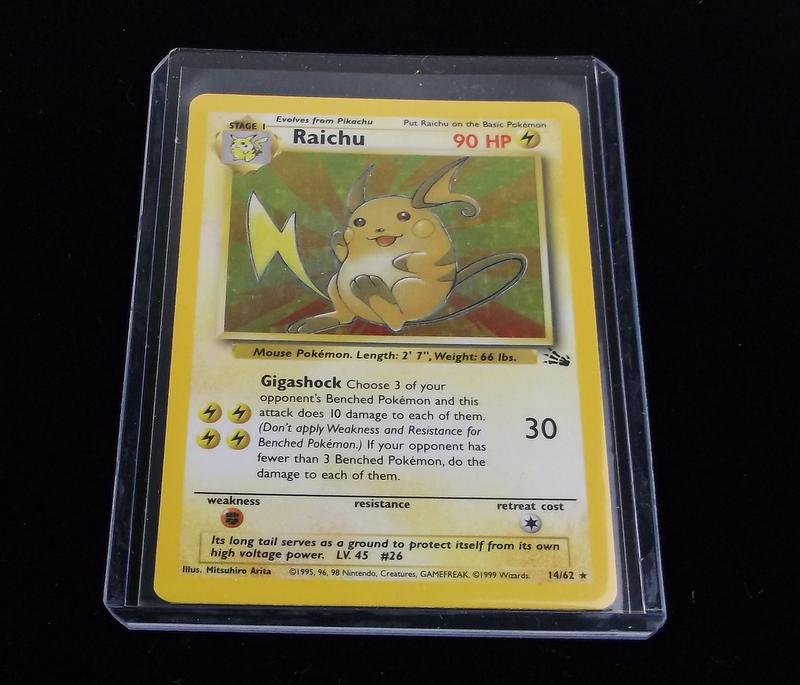 Vintage 1999 Pokemon Raichu Rare Holo Card: A Vintage Pokemon Original Card in Top Loader and penny sleeve