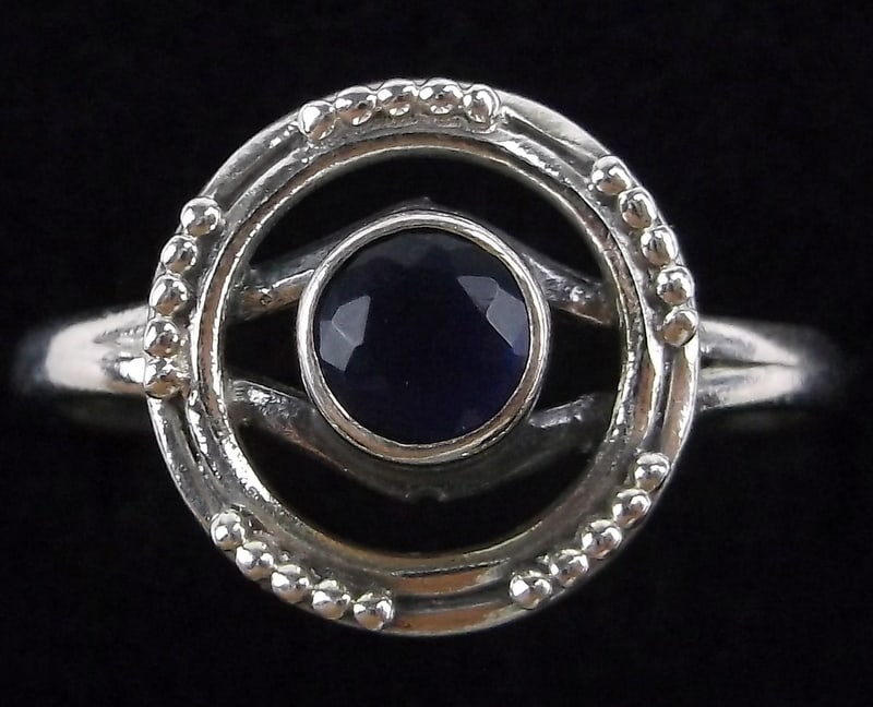 New Sterling Silver Circular Tanzanite Ring Size 10: Solid Sterling Silver Guaranteed, in Brand New Never Worn Condition.
