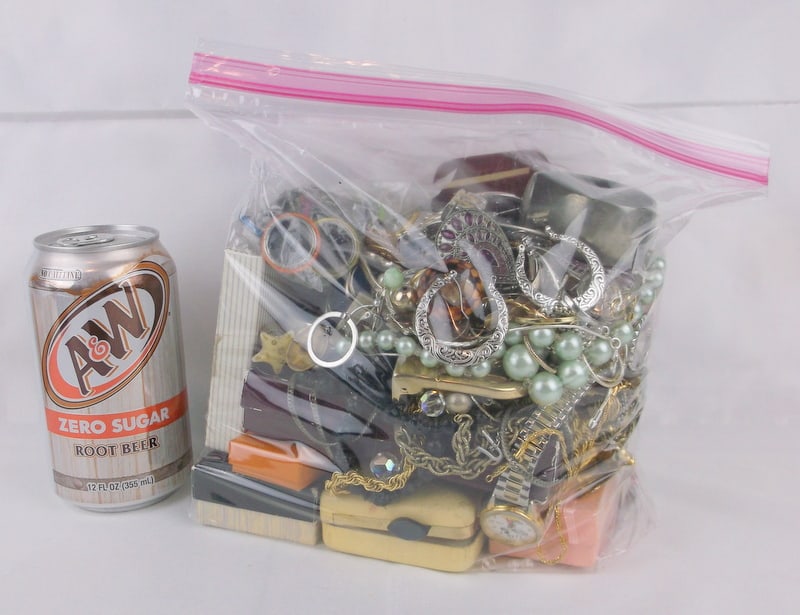 5lb Bag of Mixed Vintage Jewelry Mickey Watch & More: We have a large collection of jewelry from Large Estate Jewelry Purchases over the years. They have been sitting in our warehouse for some time and we are making large bags of this jewelry to sell in 