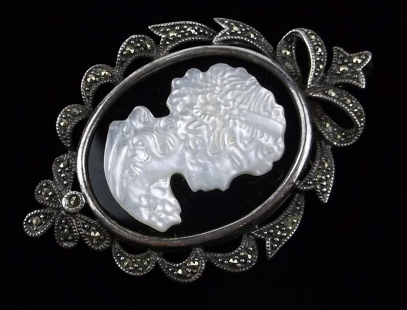 New vintage Sterling Silver Onyx MOP Cameo Brooch Pendant: Solid Sterling Silver Guaranteed, in Brand New Never Worn Condition.