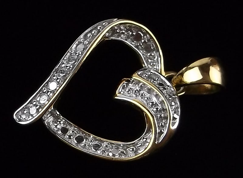 New Gold Over Sterling Silver Diamond Heart Pendant: Solid Sterling Silver Guaranteed, in Brand New Never Worn Condition.