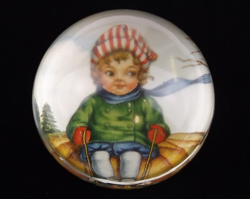 Mint Vintage 1950s Sledding Girl Christmas Paperweight (1 of 3)