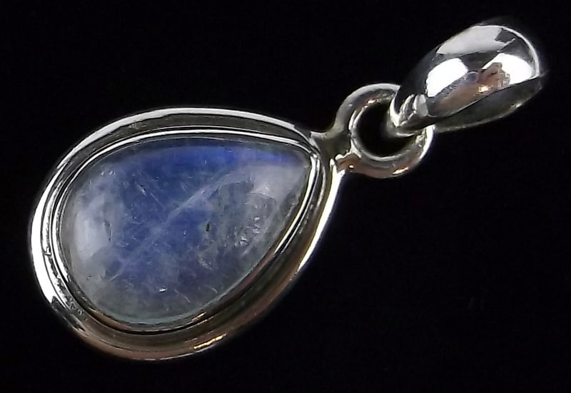 New Sterling Silver Moonstone Teardrop Pendant: Solid Sterling Silver Guaranteed, in Brand New Never Worn Condition.