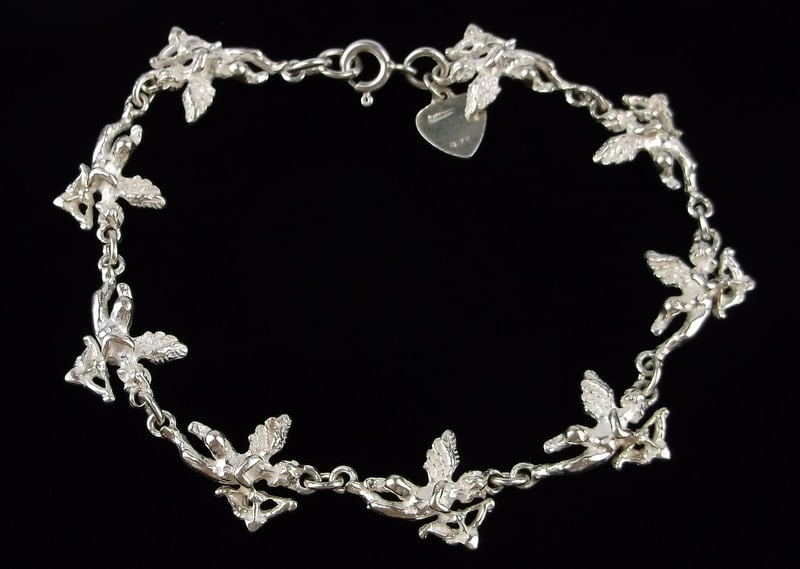New Vintage Sterling Silver Cupid Angel Bracelet 8": Solid Sterling Silver Guaranteed, in Brand New Never Worn Condition.