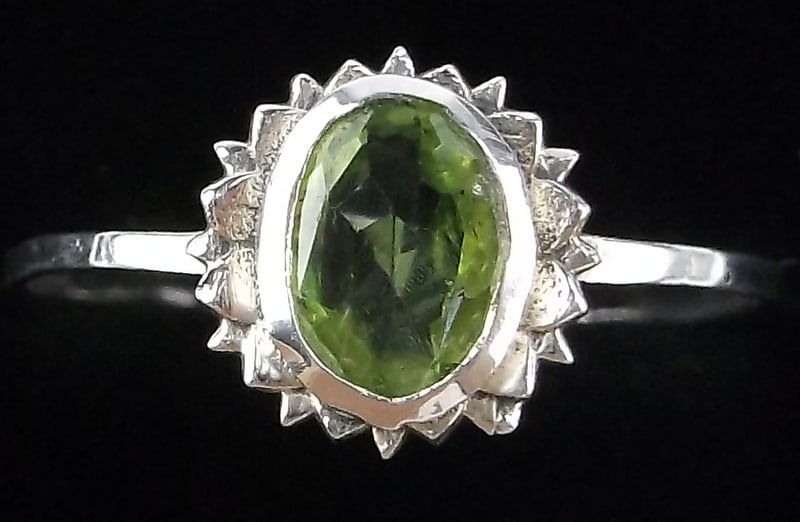 New Sterling Silver Peridot Sun Ring 8: Solid Sterling Silver Guaranteed, in Brand New Never Worn Condition.