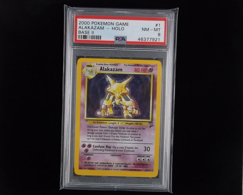 2000 Pokemon Alakazam Rare Holo Base 2nd Edition PSA 8 (1 of 2)