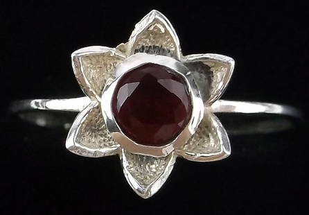 New Sterling Silver Garnet Lotus Ring 8: Solid Sterling Silver Guaranteed, in Brand New Never Worn Condition.