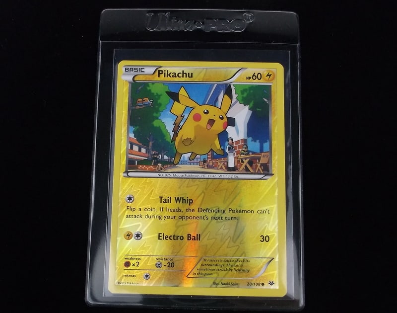 NM-M 2015 Pokemon Pikachu Reverse Holo Card (1 of 2)