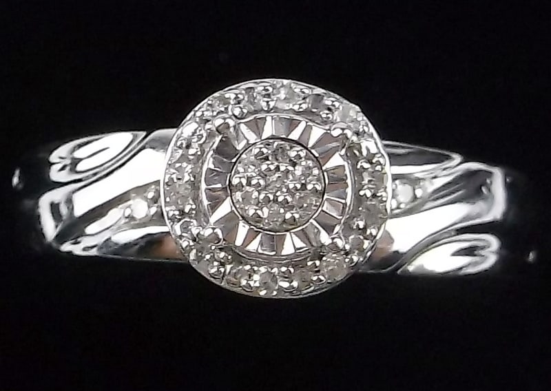 New Designer Sterling Silver Diamond Engagement Ring 7: Solid Sterling Silver Guaranteed, in Brand New Never Worn Condition.