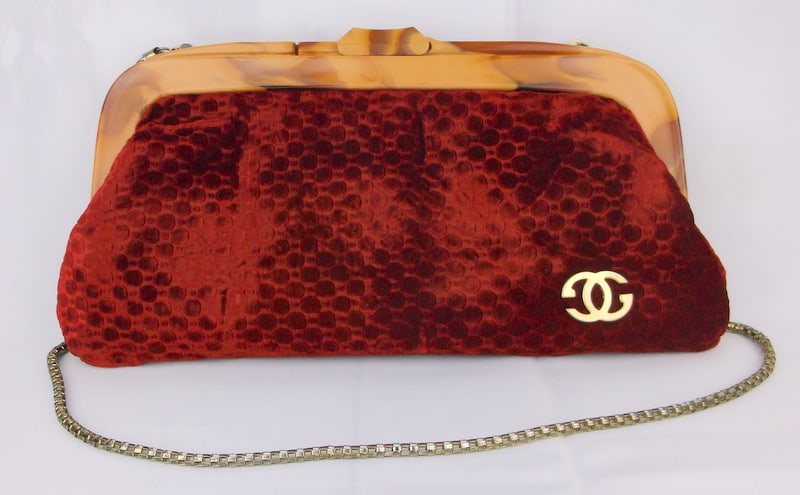 RARE Gorgeous 1960s CHANEL Velvet Bakelite Chained Purse: A Rare Gorgeous Vintage 1960s Coco Chanel Red Velvet and Marbled Bakelite Handle Purse. There is one small spot as shown in one of the last pictures where there is a black sticky like substance on the