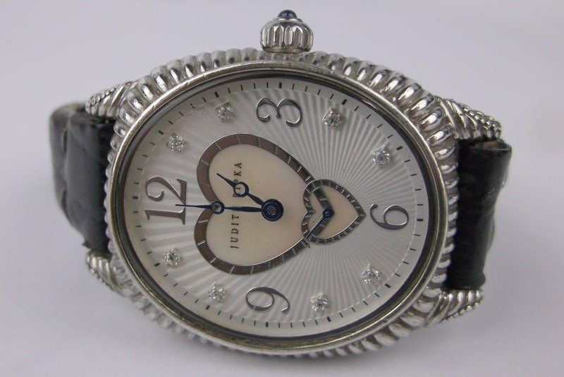 Vintage Judith Ripka Sterling Silver Wristwatch Works Great: A vintage Judith Ripka Sterling Silver Watch, Works great has New Battery, Needs a New Band the one it has is pretty rough but still holds