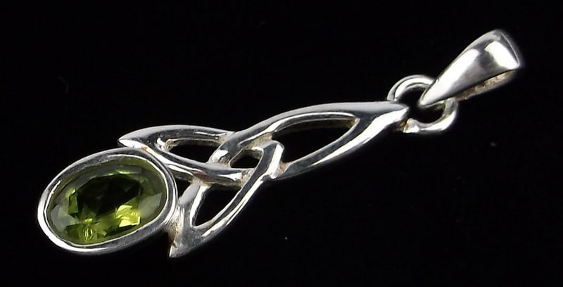 New Designer Sterling Silver Peridot Celtic Pendant: Solid Sterling Silver Guaranteed, in Brand New Never Worn Condition.