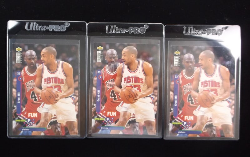 3 NM-Mint 1995 Michael Jordan Grant Hill #45 Jersey Cards: y A vintage Authentic Michael Jordan Card in the titled condition.