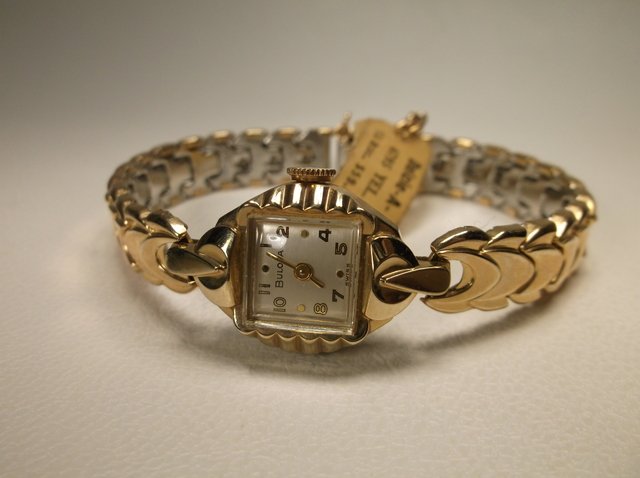 Antique NEW 10k RGP Bulova Wristwatch w Tags: Antique New Old Stock With Tags Womens Bulova Dulcie A 10kt RGP wristwatch, perfect condition, works and winds perfect, never used or worn, amazing find