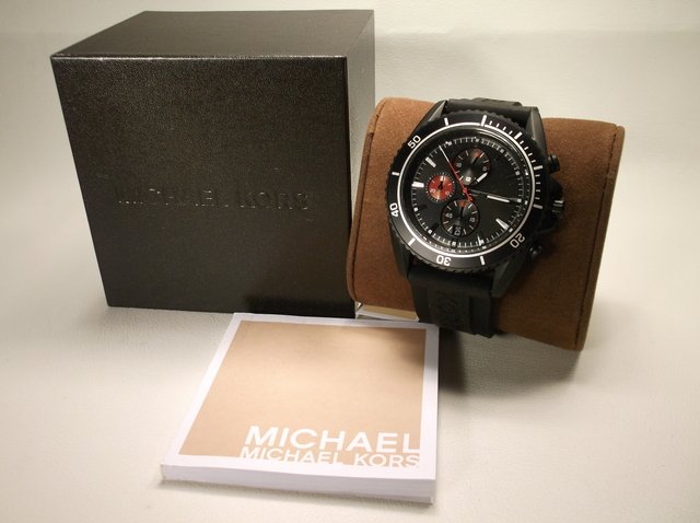 Genuine Michael Kors Mens Wristwatch NEW $225: brand spanking new, beautiful mens Authentic Michael Kors Wristwatch in box, with papers, works perfect, in perfect condition. Retails $225