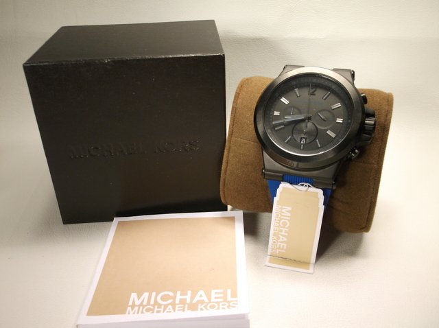 Genuine Michael Kors Mens Wristwatch NEW $225: brand spanking new, beautiful mens Authentic Michael Kors Wristwatch in box, with papers, works perfect, in perfect condition. Retails $225