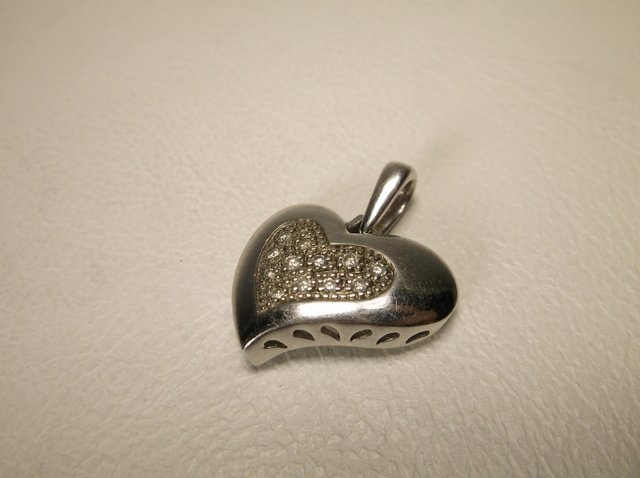 Beautiful Sterling Silver Gen Diamond Pendant Signed: Signed C N A with genuine diamonds