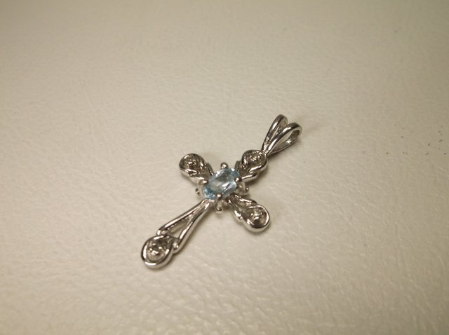Beautiful Sterling Silver Topaz Gen Diamond Cross: .