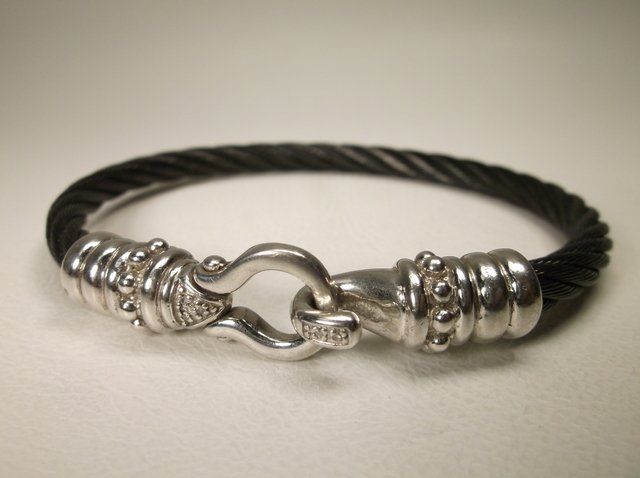 Beaut Sterling Silver Gen Diamond Steel Bracelet: front is sterling silver, band is stainless steel, contains genuine diamonds on sterling part of bracelet