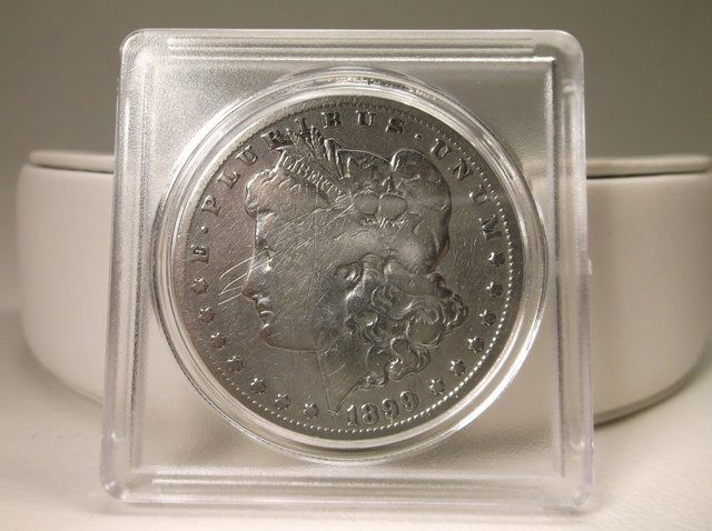 1899 O US Silver Morgan Dollar (1 of 2)