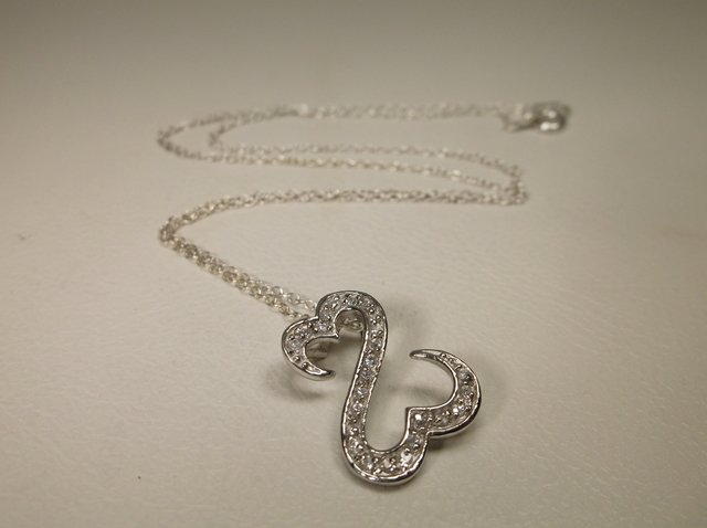 Sterling Silver Jane Seymour Open hearts Necklace: .