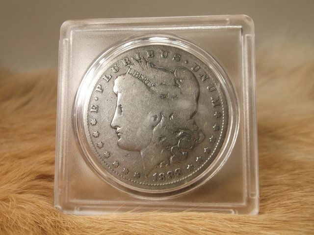 1888 O US Silver Morgan Dollar (1 of 2)