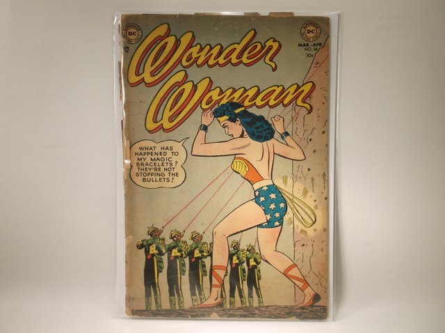 1953 DC Wonder Woman Comic Book #58 $1050: All of our comic books come housed in a new backer board and plastic sleeve. All comics are complete from front to back cover unless otherwise noted. As we are not professional graders, please view al