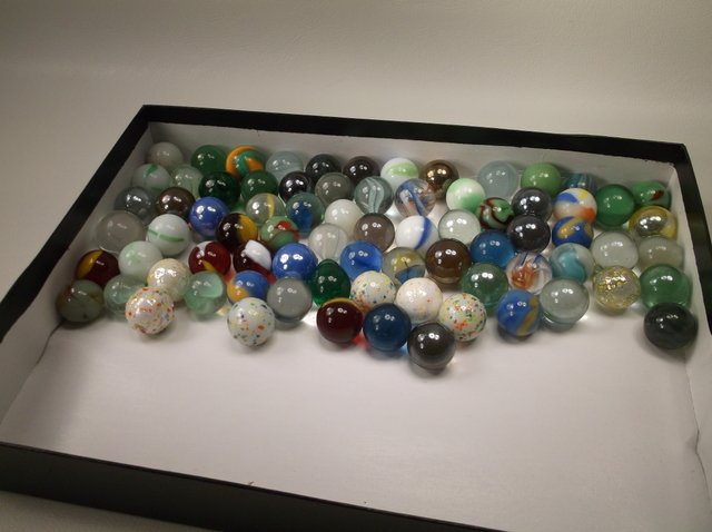 Large lot of Marbles Speckle Ox Blood Swirl: .