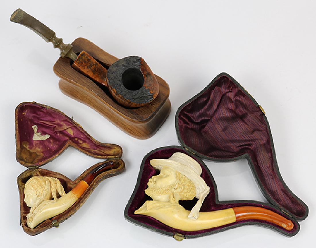 (Lot of 3) Carved smoking pipe group, consisting of two (1 of 1)