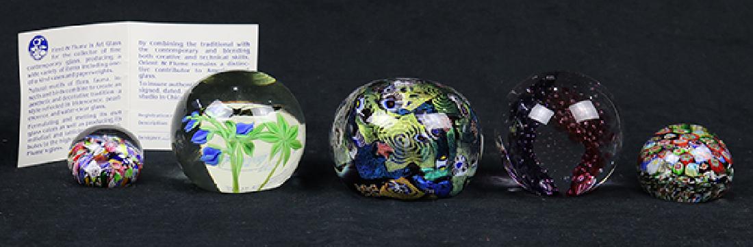 (Lot of 5) Art glass paperweights, consisting of an: (Lot of 5) Art glass paperweights consisting of an Orient and Flume example with floral accents and butterfly signed on underside ""Orient & Flume Beyers 1991 May"" (3) Mille Fleur examples in varying