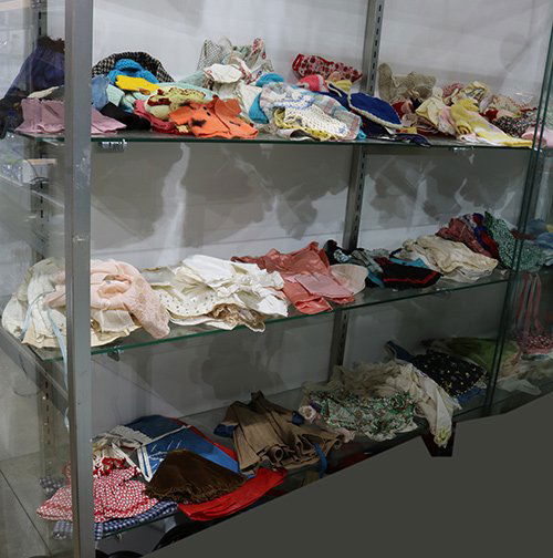 Doll clothes, many crochet and knitted examples, (1 of 2)