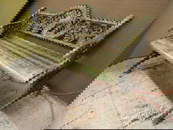 Cast iron railway bench: Cast iron garden bench with a camel medallion