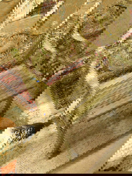 Cast iron railway bench: Cast iron garden armchair with camel medallion