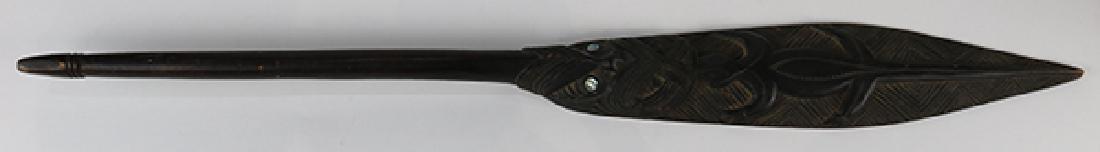 Maori ceremonial paddle: Maori ceremonial paddle, having a well carved figural reserve with shell eyes, overall 39"l