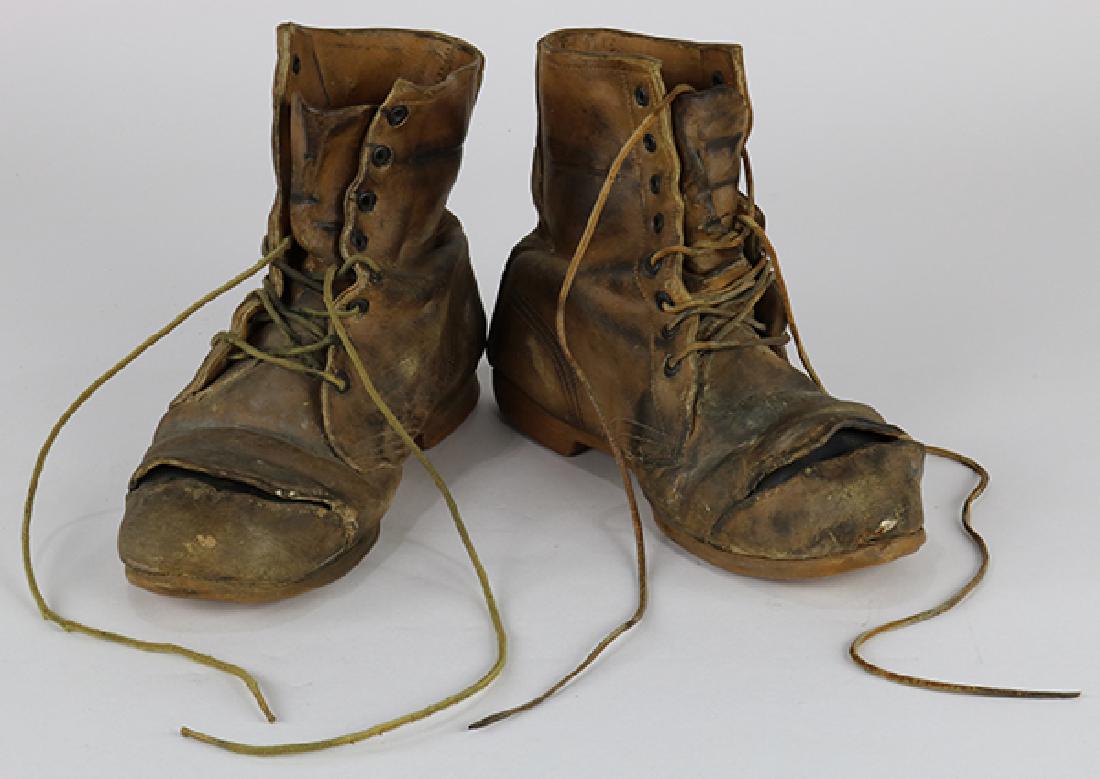 Ceramic Sculptures, Marilyn Levine: (lot of 2) Marilyn Levine (American/Canadian 1935-2005) Work Boots ceramic sculptures with leather and synthetic laces unsigned gallery label (Galleries Inc. New York New York) affixed to sole each ov