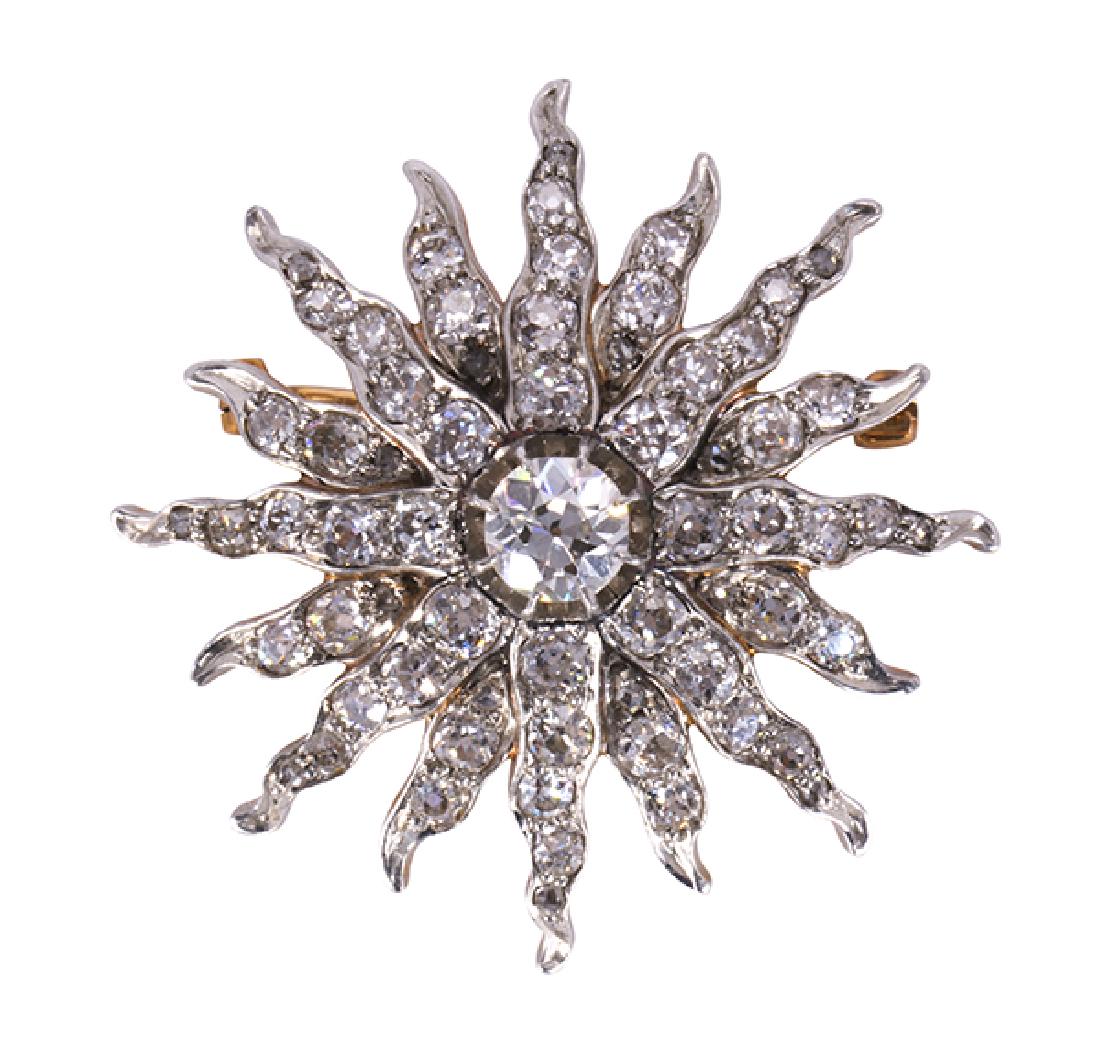 Edwardian diamond, platinum topped 14k yellow gold: Edwardian diamond, platinum topped 14k yellow gold sunburst brooch centering one old European-cut diamond, weighing approximately 0.60ct., surrounded by (64) old mine-cut diamonds, weighing a total of