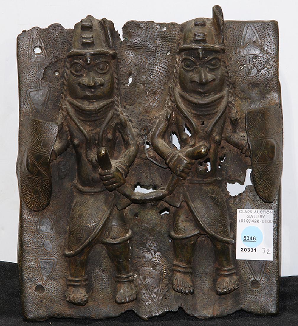 Brass wall plaque depicting two warriors with shields (1 of 1)