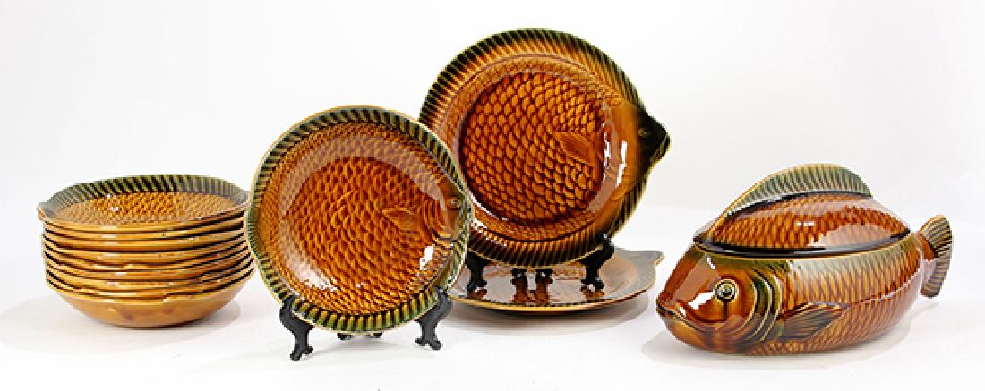 (lot of 13) Sarreguemines majolica fish set: (lot of 13) Sarreguemines majolica fish set, consisting of (10) shallow bowls, 8"dia, (2) plates, 10"dia, and a covered tureen, 6.5"h