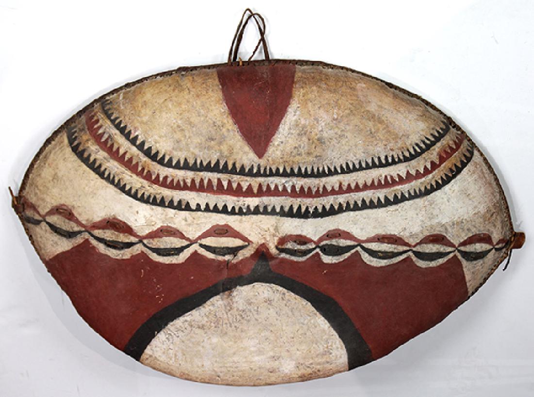 Maasai Kenya shield, the polychrome asymetric shield of (1 of 2)