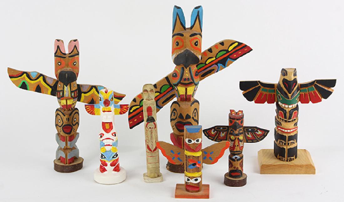 (lot of 7) Pacific Northwest Native American miniature: (lot of 7) Pacific Northwest Native American miniature totem pole group, largest 8.5"h