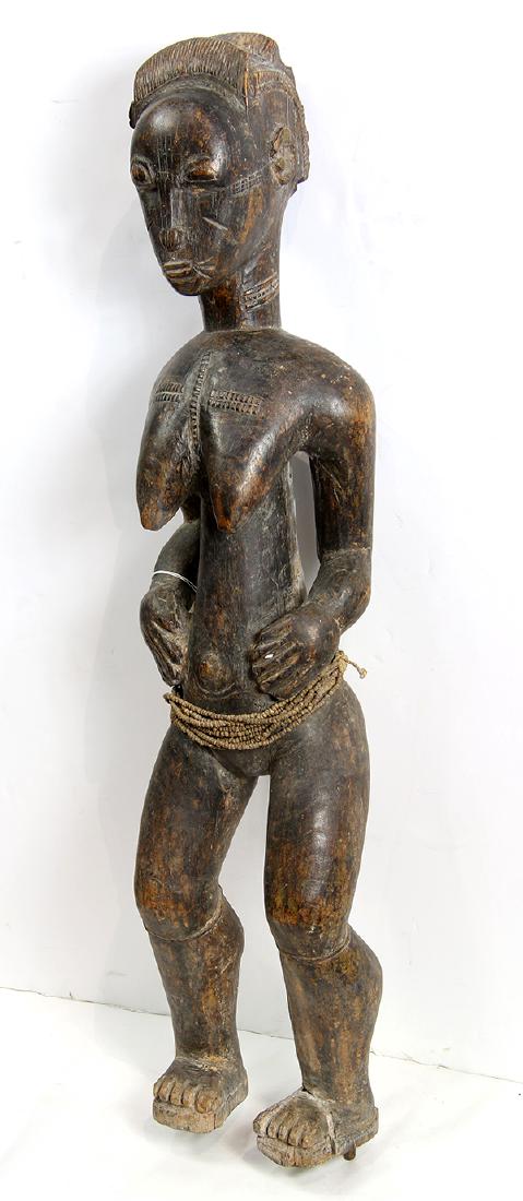 Baule, Cote d'Ivoire, female figure, possibly a (1 of 3)
